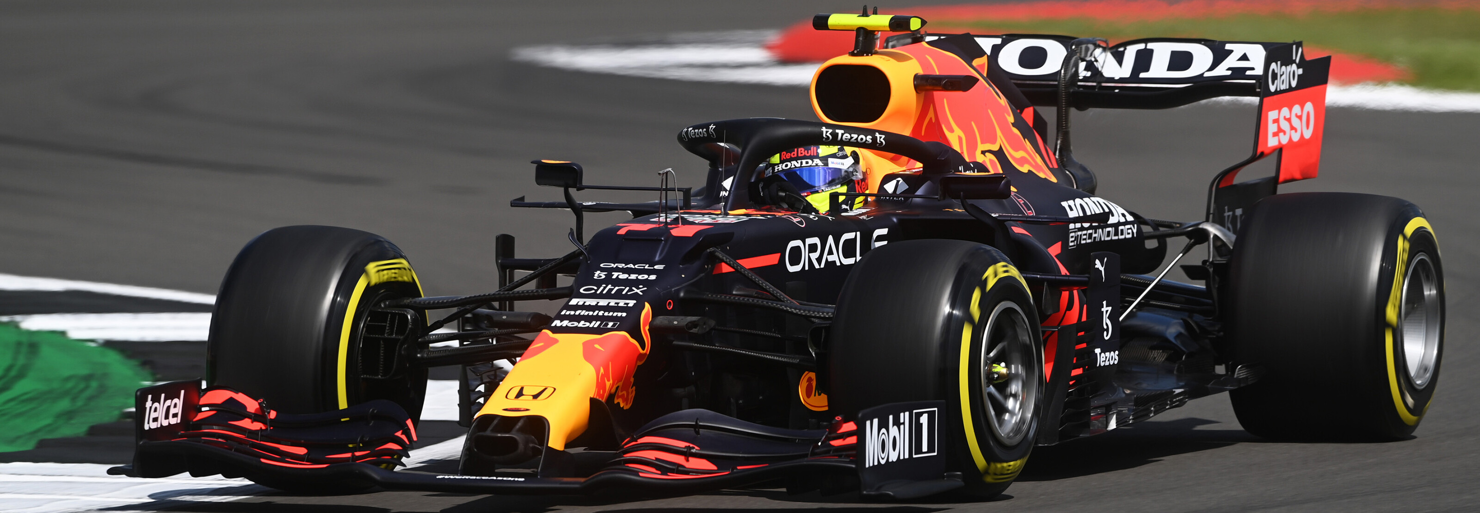 Checo's Red Bull Racing Honda race car negotiating a corner